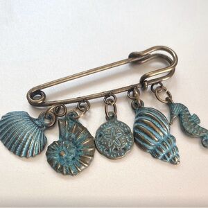 Brand new, custom crafted, charms, Bronze and Turquoise Seashell Charm Brooch